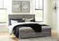 Bronyan King Panel Bed with Mirrored Dresser and Chest